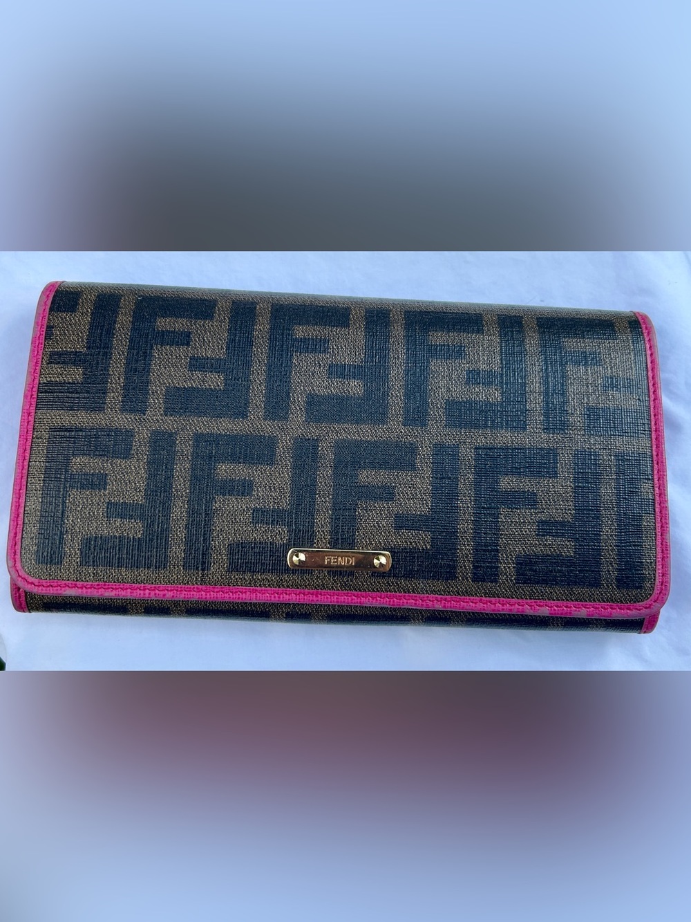 Fendi Tobacco/Pink Zucca Coated Canvas Flap Continental
Wallet. ECU